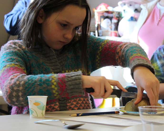 Lena Thomas cuts up a potato in preparation for her dish for the judges to taste on Wednesday afternoon. 