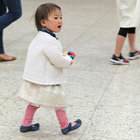 Chloe Park, 18 months, whose family is from South Korea, takes in the sights and sounds of International Night at Lynnwood Elementary School. 