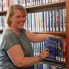 Debbie Scott, the new director of the Westerlo Public Library shelves books